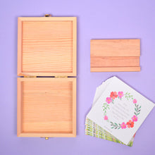 Load image into Gallery viewer, Girls under 8 quote card box open, all cards and timber stand on display.
