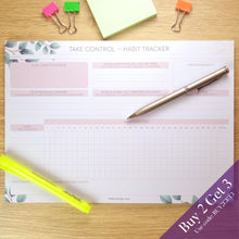 Load image into Gallery viewer, Pink habit tracker on display with buy 2 get 3 offer