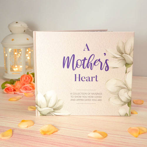 A mother's heart book on display with yellow roses